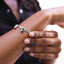 woman wearing a bell bangle bracelet