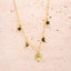 Gold necklace with star, moon, and sun pendants on a textured beige background-Gold Celestial Gypsy Necklace ā Station Necklace
18K Gold-Plated | Celestial | Hypoallergenic