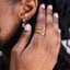 Close-up of a hand with Two-Tone Open Wrap Ring , Adjustable & Waterproof