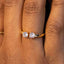 Gold ring with two diamonds on a person's finger. Twin Stone Sparkle Open Ring – Gold or Rhodium Plated
Timeless | Adjustable Fit | Premium Finish