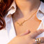 Person wearing a gold `Layla` necklace with a name pendant on a white shirt. Personalised Name Necklace – 18K Gold-Plated
Waterproof | Hypoallergenic | Made-to-Order