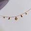 Up close shot of Gold Sun Gypsy Necklace – Vermeil 18K Gold Moon & Star Pendant