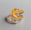 Adjustable open ring in high-polish stainless steel