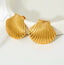 Lifestyle Shot – Earrings on a Cup
Golden Seashell Stud Earrings displayed on a ceramic cup, capturing their luminous gold finish and delicate coastal-inspired design. A perfect gift or everyday statement piece.