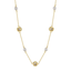 Gold clover station necklace with pearl accents on a white background