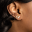 Tiny gold CZ stud earring for multiple piercings.