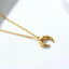 Close up image of Gold & Rhodium Moon Necklace – 14K Gold Over Sterling Silver.