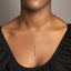 Model wearing y necklace