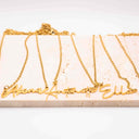 Gold necklaces with names on a white background. Personalised Name Necklace – 18K Gold-Plated

Waterproof | Hypoallergenic | Made-to-Order