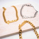 Custom Name Bracelets Gold – Waterproof &amp; Tarnish Free- Gold and silver name bracelets on a textured surface