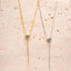 Silver and gold plated sterling silver moissanite drop necklaces shown side by side for finish comparison