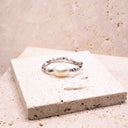 Pearl beaded elasticated ring with sterling silver bead and premium 0.50 micron plating