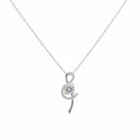 Silver necklace with a delicate pendant on a light white background