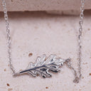 Minimal oak leaf chain bracelet in rhodium plated silver