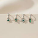 Emerald Charm Clicker Hoop Earrings featuring four designs with green gemstones on silver hoops.