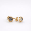 Mini CZ Stud Earrings – 4mm Gold PVD Stainless Steel with round cut cubic zirconia in bezel setting.