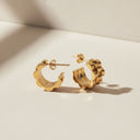 Chunky Watch Link Huggie Hoop Earrings showcasing a bold and stylish design.