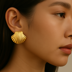 Model Wearing the Earrings (Lifestyle Wear Shot)
Model showcasing the Golden Seashell Stud Earrings, styled with effortless elegance for everyday wear. Perfect 20mm size adds a radiant glow to casual and chic outfits.