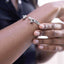Close-up of a person's wrist with s925 Sterling Silver Bell Bangle – Handmade & Adjustable

100% 925 Silver | Adjustable Fit | Hypoallergenic
