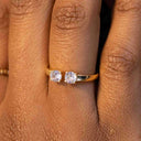 Gold ring with two diamonds on a person's finger. Twin Stone Sparkle Open Ring – Gold or Rhodium Plated

Timeless | Adjustable Fit | Premium Finish
