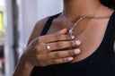 Elasticated pearl ring with sterling silver bead worn on hand, easy on and off everyday jewellery