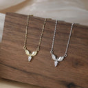 Angel Wings CZ Necklace – Silver or Gold

Gold or Silver | 925 Sterling Silver | HypoallergenicAngel Wings CZ Necklace.