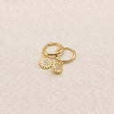 Mini Gold Huggie Hoop Earrings with Sunflower Charm on a white background