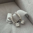 Close-up of Huggie Hoop Earrings, in a gift box