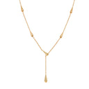 A gold Y-necklace featuring five pointed cone-shaped spikes along the chain and a teardrop dangle pendant at the center, shown against a plain white background.