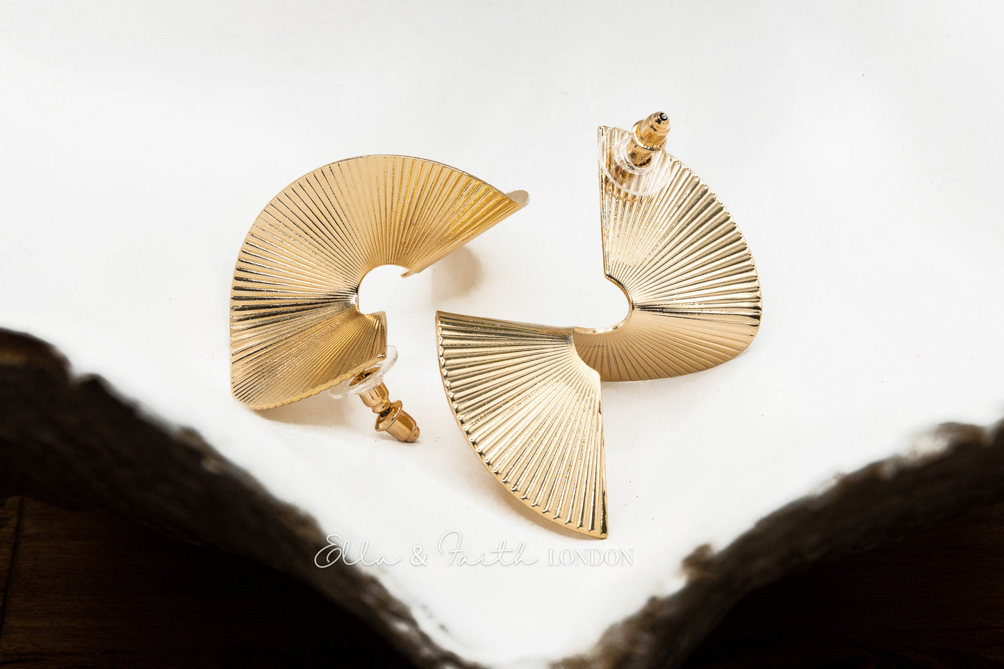 Chunky 14K gold statement earrings with mirror finish