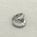 Tiny Pave Huggie Hoop Earrings - 7mm with Pave CZ gemstones.