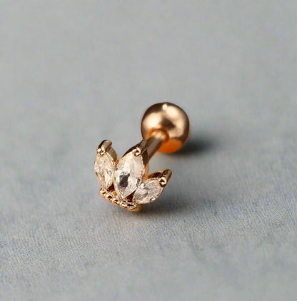 Gold lotus piercing stud – hypoallergenic tragus & cartilage jewellery by Ella and Faith London.