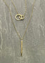 Minimalist gold circle and bar necklace – delicate everyday jewellery by Ella and Faith London.